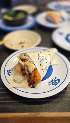 Kura Revolving Sushi Bar by null