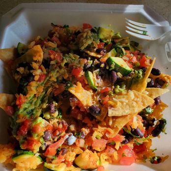 Calesa Mexican Restaurant - Custom nachos, rice shredded cheese pico de gallo guacamole black beans zucchini, with enchilada sauce salsa and sour cream on the side - Mexican Near Me - Kilgore, Texas Calesa Mexican Restaurant - Custom nachos, rice shredded cheese pico de gallo guacamole black beans zucchini, with enchilada sauce salsa and sour cream on the side - Mexican Near Me - Kilgore, Texas