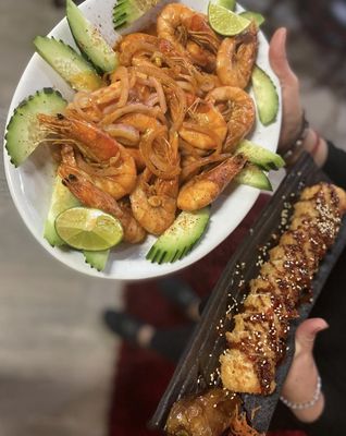 Mariscos y Sushi Los Tomateros by null