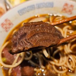 closeup of the beef in the noodle soup..