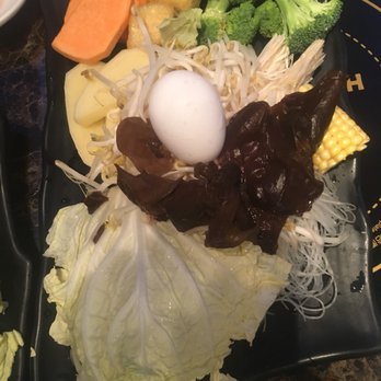 Han Restaurant - All of the veggies and accoutrements that come with the broth + proteins - Hot Pot Near Me - Hartford, Connecticut Han Restaurant - All of the veggies and accoutrements that come with the broth + proteins - Hot Pot Near Me - Hartford, Connecticut