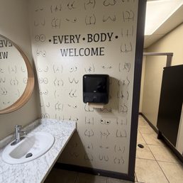 The woman's bathroom wall. The woman's bathroom wall.