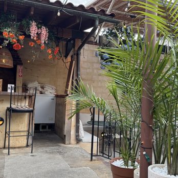Lulu’s Winegarden - Part of the garden back patio - Wine Bars Near Me - Washington, DC, District of Columbia