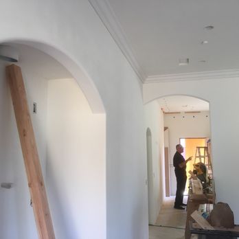 Martinez Construction - a man standing in a hallway - Damage Restoration Near Me Martinez Construction - a man standing in a hallway - Damage Restoration Near Me