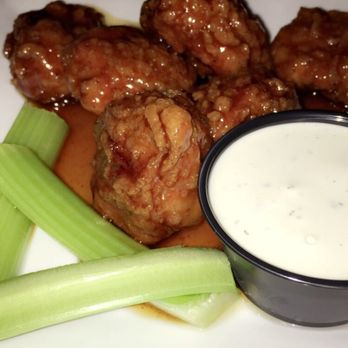Showboat Saloon - Stingin' Honey Garlic Wings - Bars Near Me - Wisconsin Dells, Wisconsin Showboat Saloon - Stingin' Honey Garlic Wings - Bars Near Me - Wisconsin Dells, Wisconsin