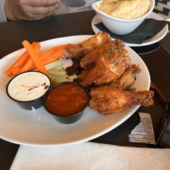 Mom's Kitchen & Bar - My friend ordered the fried chicken & grits. - Bars Near Me - Astoria, New York Mom's Kitchen & Bar - My friend ordered the fried chicken & grits. - Bars Near Me - Astoria, New York
