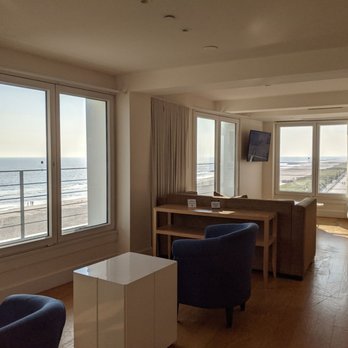 Allegria Hotel - Sunset king suite. You can see the scratches on the floor. The blue chair at the corner of this pic allows you to stare at the wall lol. - Hotels Near Me - Long Beach, New York Allegria Hotel - Sunset king suite. You can see the scratches on the floor. The blue chair at the corner of this pic allows you to stare at the wall lol. - Hotels Near Me - Long Beach, New York