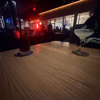 JOEY Manhattan Beach - Lemon drop martini and the dining room at night - New American Near Me - Manhattan Beach, California JOEY Manhattan Beach - Lemon drop martini and the dining room at night - New American Near Me - Manhattan Beach, California
