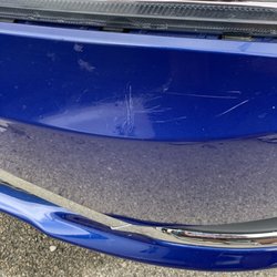 Budget Airport Parking - Another pic of damaged fender before rental