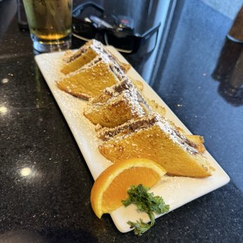 Keke's Breakfast Cafe - Nutella stuffed french toast - Breakfast & Brunch Near Me - Kissimmee, Florida Keke's Breakfast Cafe - Nutella stuffed french toast - Breakfast & Brunch Near Me - Kissimmee, Florida