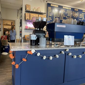 Waterfront Coffee Company - a man sitting at the counter - Coffee & Tea Near Me - Edmonds, Washington Waterfront Coffee Company - a man sitting at the counter - Coffee & Tea Near Me - Edmonds, Washington