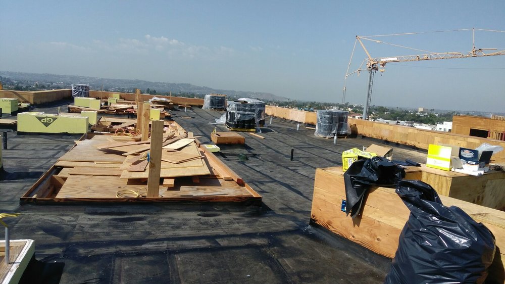 Slide of APR Roofing Solutions