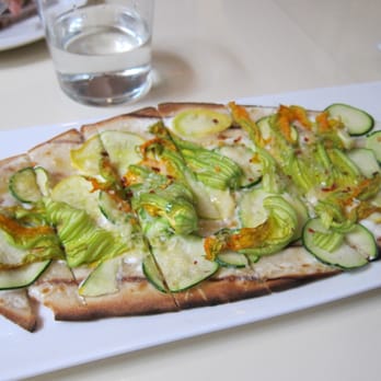 The Well - Chickpea flatbread with squash blossoms - Bars Near Me - Oakland, California The Well - Chickpea flatbread with squash blossoms - Bars Near Me - Oakland, California