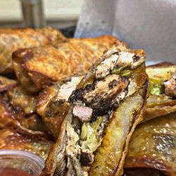 Euro Cuisines - Jerk chicken egg rolls w/ sweet plantain