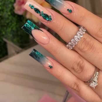Kitty Nails And Spa - This is the inspo. I just asked for this but medium length instead, with white glitter and silver gems. That's all I asked for. - Nail Salons Near Me - Chino Hills, California