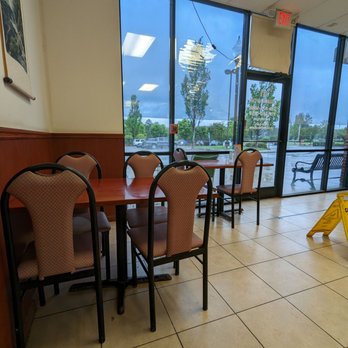 China Wok - a restaurant with tables and chairs - Chinese Near Me - Wake Forest, North Carolina China Wok - a restaurant with tables and chairs - Chinese Near Me - Wake Forest, North Carolina