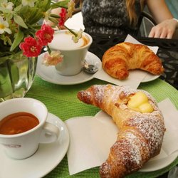 Breakfast at Marinoni's: Croissants with and without vanilla cream, cappuccino, and espresso.