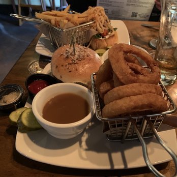 Griffon Gastropub - Mangia Steak Sandwich with fries Beef on Weck w. Onion rings - Gastropubs Near Me - East Aurora, New York