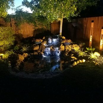 Capital Landscape - An image of our water feature after being completed at night time. - Landscape Architects or Designers Near Me - Roseville, California