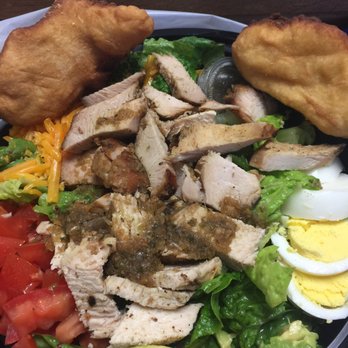 Back A Yard Caribbean Grill - Caribbean Chicken Cob Salad with a side of Jamaican Fried Cornmeal Bread - Caribbean Near Me - Campbell, California Back A Yard Caribbean Grill - Caribbean Chicken Cob Salad with a side of Jamaican Fried Cornmeal Bread - Caribbean Near Me - Campbell, California