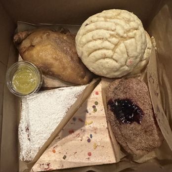 Comadre Panaderia - Empanada, vanilla concha, cherry dona, strawberry cake, guava pastelito, prickly pear galleta ( not shown) - Bakeries Near Me - Austin, Texas