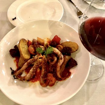 Grouse Mountain Grill - Grilled octopus with chorizo and fingerling potatoes over romesco sauce - New American Near Me - Avon, Colorado