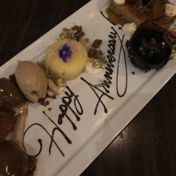 Vida - we got this sweet dessert plate with a taste of every desert! super yummy and so nice - New American Near Me - Indianapolis, Indiana