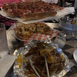 Meat lovers pie, white pie with chicken and cheese fries :) Meat lovers pie, white pie with chicken and cheese fries :)