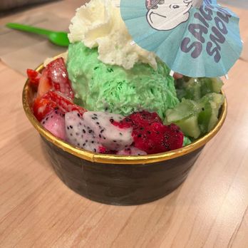 Saigon Snow - Small pandan snow with dragon fruit, strawberries, banh tam khoai mi, banh da lon, rice crispies, topped with whipped cream - Shaved Ice Near Me - Orlando, Florida Saigon Snow - Small pandan snow with dragon fruit, strawberries, banh tam khoai mi, banh da lon, rice crispies, topped with whipped cream - Shaved Ice Near Me - Orlando, Florida