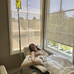 Me getting an IV, feeling pampered