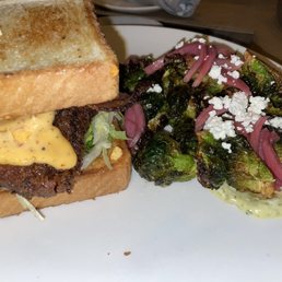 Fried chicken sandwich and crispy Brussel sprouts