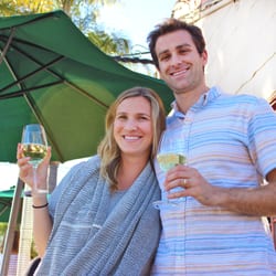 Seeker Tours - Redeeming a glass of wine included in the package at Corks n' Crowns.