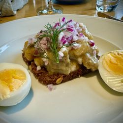 Hovås Kallbadhus Restaurant - Open face sandwich of perfectly prepared pickled herring with mustard... This is the best herring I ever had