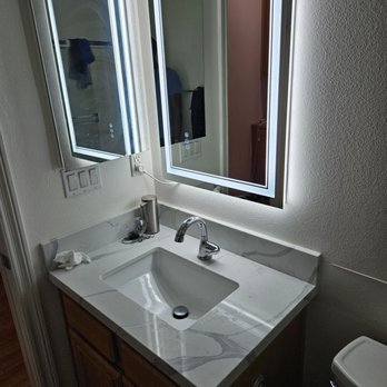Kitchen & Bath Design Center - Guest bathroom after Jean's remodel + new mirror w lights - Flooring Near Me - Anaheim, California Kitchen & Bath Design Center - Guest bathroom after Jean's remodel + new mirror w lights - Flooring Near Me - Anaheim, California