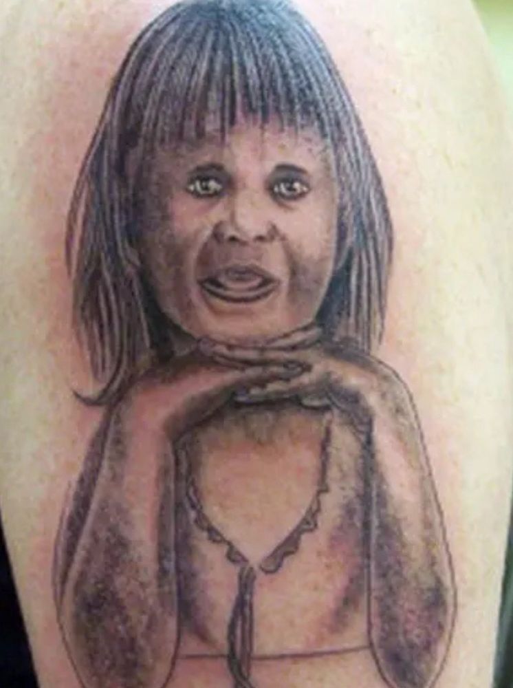 Against the Grain Tattoo Studio Logo