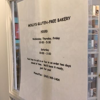 Molly's Gluten-Free Bakery - a sign in a window - Bakeries Near Me - Pewaukee, Wisconsin