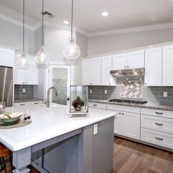 Katrina Quinn - HomeSmart - Light & bright gourmet kitchen in a custom home in Central Phoenix. Represented the buyers.