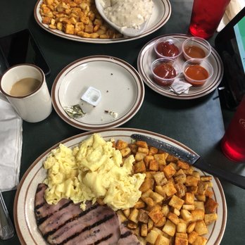 Egg Works - Grandma 's Biscuits & Gravy & The Classic. The middle plate is from the banana muffin - Breakfast & Brunch Near Me - Las Vegas, Nevada