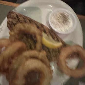 Backyard Grill & Bar - Red snapper and onion rings - Steakhouses Near Me - Loves Park, Illinois Backyard Grill & Bar - Red snapper and onion rings - Steakhouses Near Me - Loves Park, Illinois