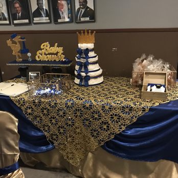 The Clubhouse - a table with a blue and gold cake - Lounges Near Me - San Antonio, Texas The Clubhouse - a table with a blue and gold cake - Lounges Near Me - San Antonio, Texas