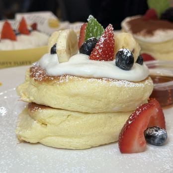 Fluffy Fluffy - Fluffy, airy batter but it still has a strong structure to hold up the cream and berries - Desserts Near Me - Tustin, California