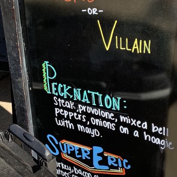 Hero Or Villain - a sign on the side of a building - Sandwiches Near Me - Ferndale, Michigan