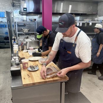 Street Eats - The man finishing up my to-go order. - Burgers Near Me - St. George, Utah