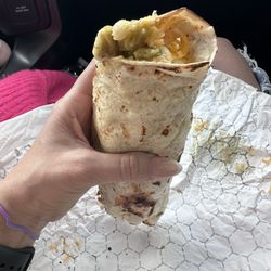 Bosa Donuts - Potato and egg burrito with cheese and green chile sauce, with added refried beans.