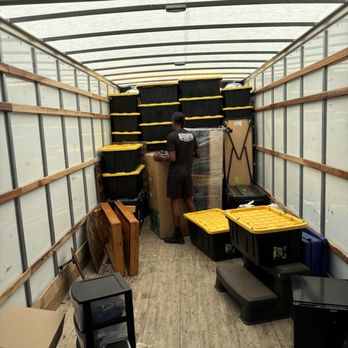 QuickSwitch Movers - Mover loading moving truck - Movers Near Me