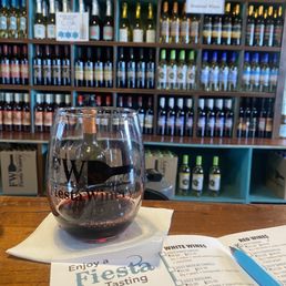 a glass of wine on a table