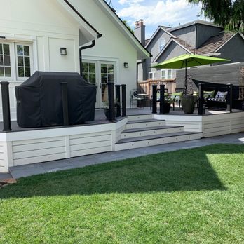 Nguyen Landscaping and Construction - Re-graded lawn, installed stone patio and walkway, sod and flowerbeds - Landscaping Near Me Nguyen Landscaping and Construction - Re-graded lawn, installed stone patio and walkway, sod and flowerbeds - Landscaping Near Me