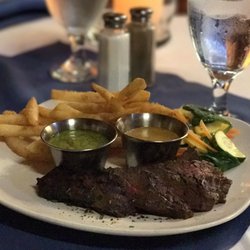 Hunt Store - Hanger steak with a green and red chimiccuri sauce, sautéed fresh vegetables and fries.