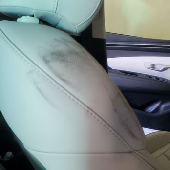 Caliber Collision - Left greasy handprints all over our grey leather - Body Shops Near Me - Austin, Texas