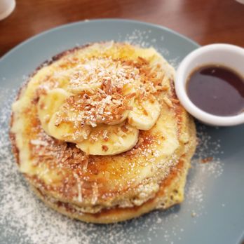 Belly Cake - Creme Brulee pancakes with coconut shavings. - Pancakes Near Me - Bayside, New York Belly Cake - Creme Brulee pancakes with coconut shavings. - Pancakes Near Me - Bayside, New York